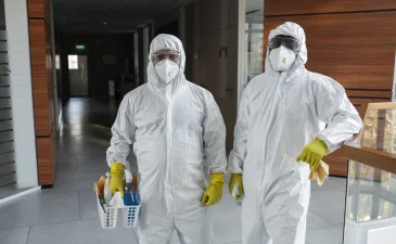 ~blog/2023/12/2/medium shot people cleaning hazmat suits